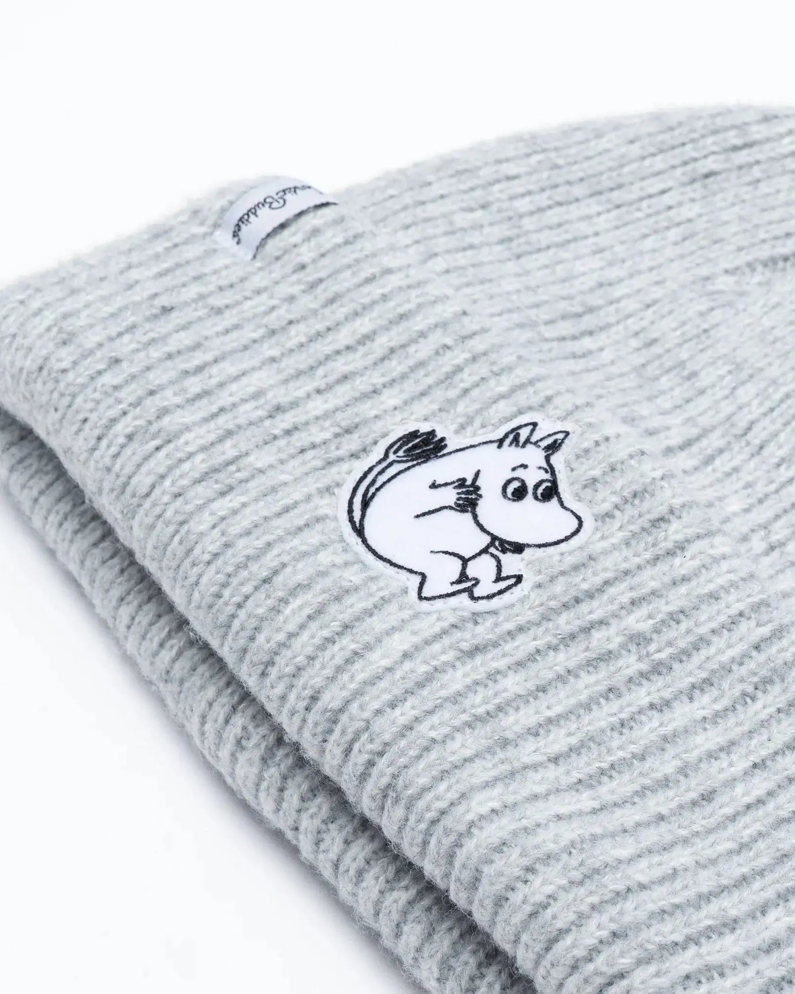 Harmaa lämmin pipo lapsille. Pipossa muumipeikon kuva.